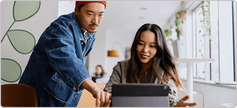 Case study cover image of two employees working together